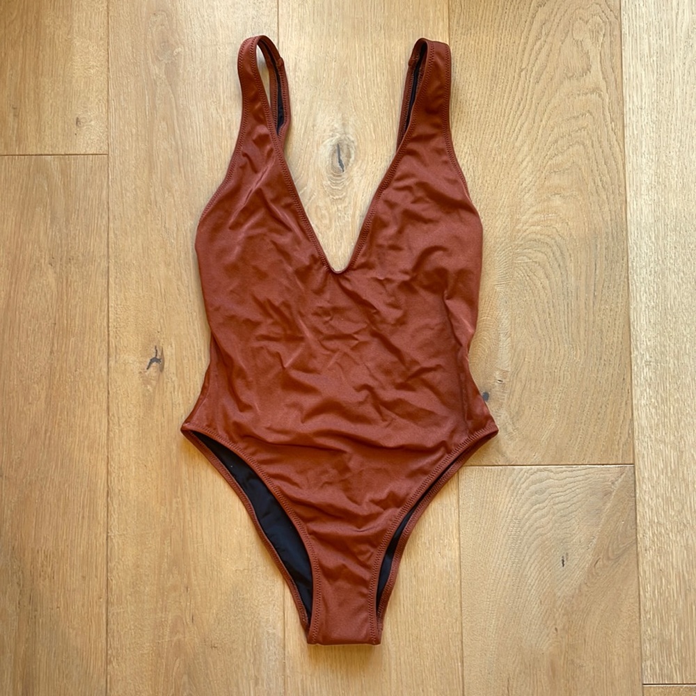 Solid and striped one piece NWT Size M